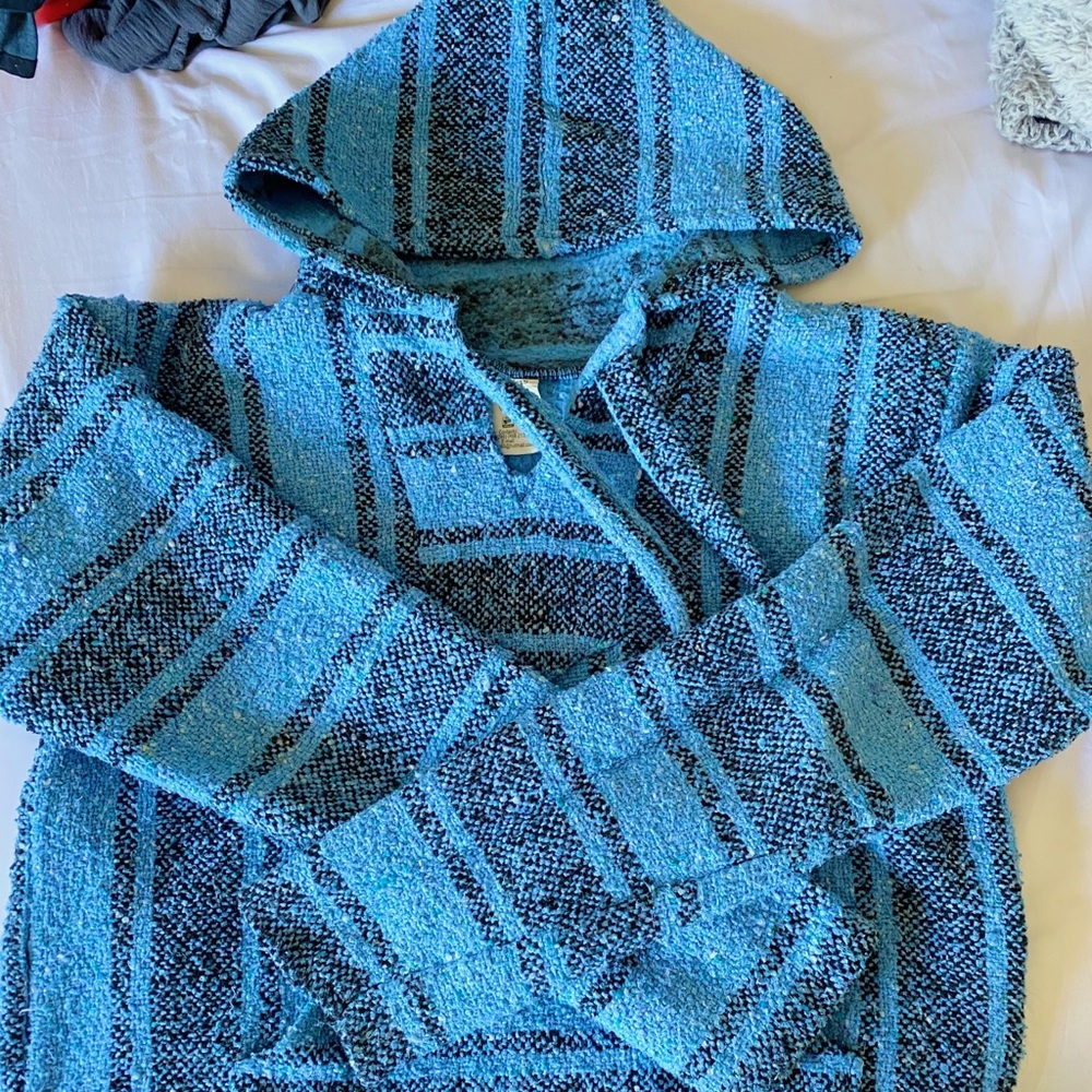 blue and black poncho